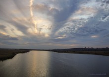 Вечер над Аксаем, городом и рекой