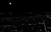 Луна в ночном небе над Аксаем